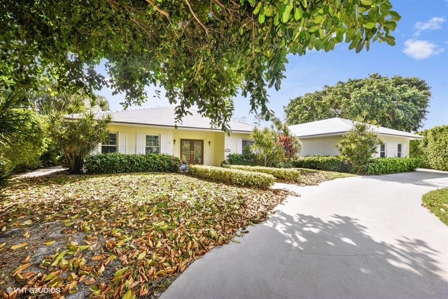2730 Cardinal Circle Gulf Stream, FL 33483 - Photo 6 of 35 a house with a tree in front of it
