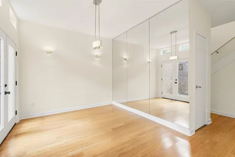 a view of entryway and hall with a window