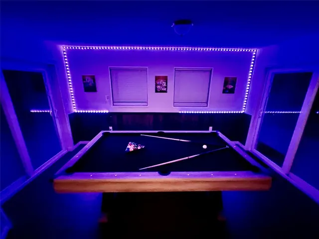 a room that has a dresser in it