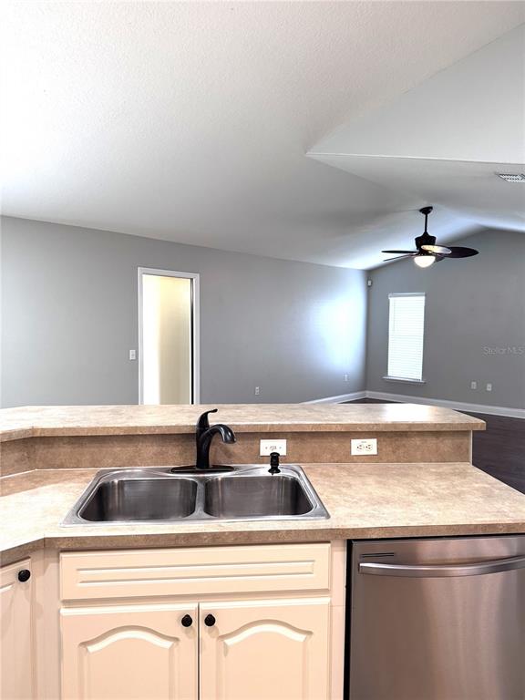 2616 Hickory View Loop Lakeland, FL 33813 - Photo 17 of 39 a view of a kitchen with a sink and chandelier