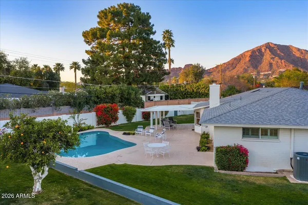 a view of a city with mountains in the background