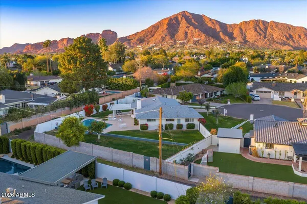 an aerial view of houses and outdoor space