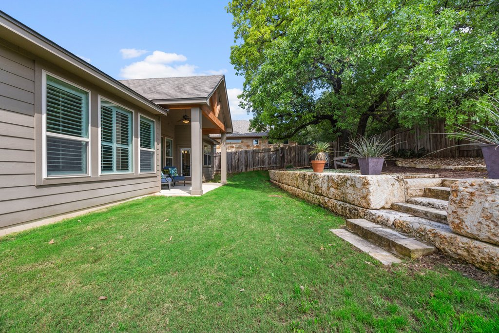 308 Morning Ridge Georgetown, TX 78628 - Photo 16 of 33 a view of a house with backyard and porch