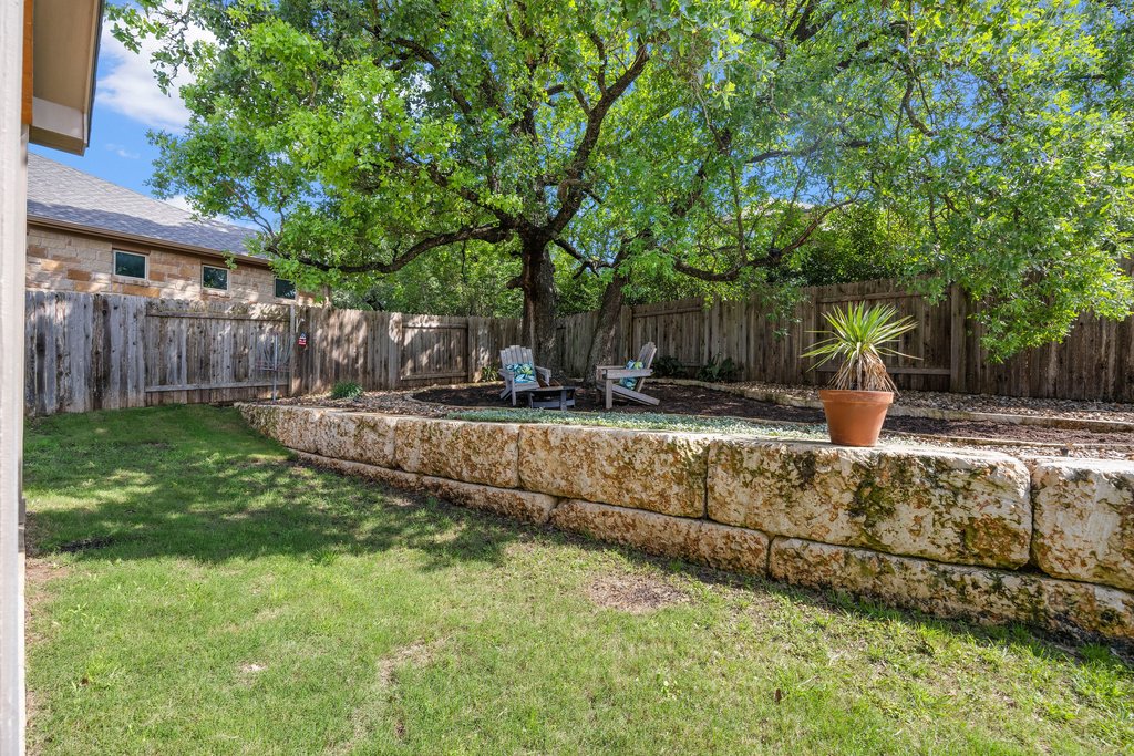 308 Morning Ridge Georgetown, TX 78628 - Photo 25 of 33 a garden view with a fountain
