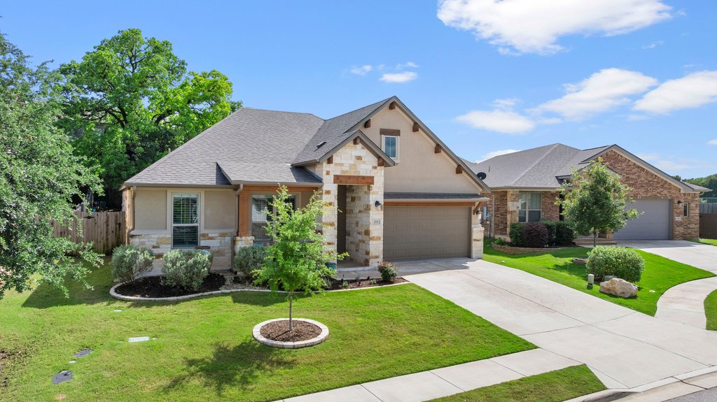 308 Morning Ridge Georgetown, TX 78628 - Photo 30 of 33 a view of a house with a yard and potted plants