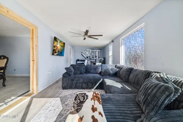a living room with furniture and a couch