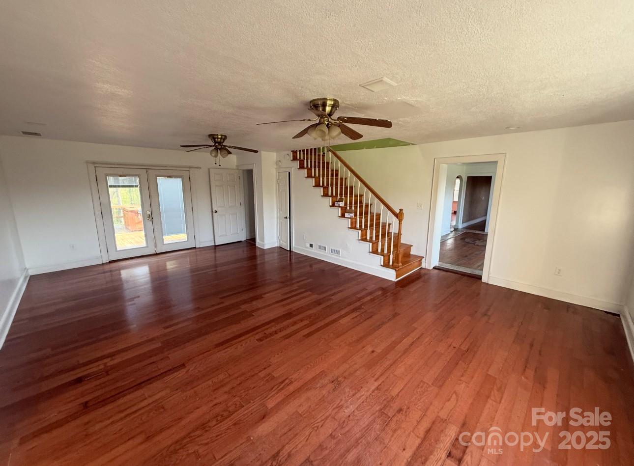 1088 Ramie Mitchell Road Hiddenite, NC 28636 - Photo 7 of 16 a view of an entryway with wooden floor