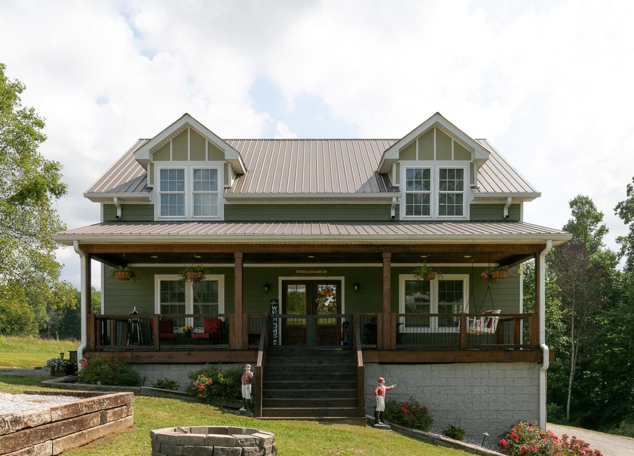 4920 Galen Road Lafayette, TN 37083 - Photo 2 of 47 a front view of a house with garden