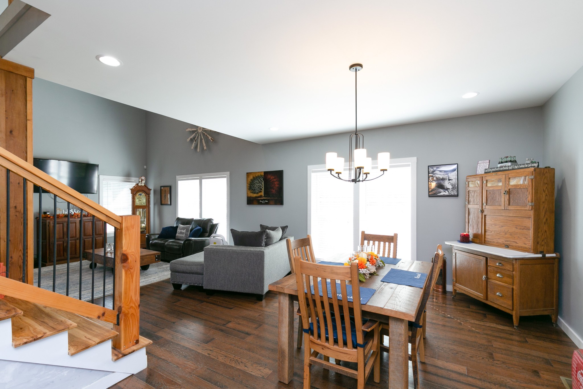 4920 Galen Road Lafayette, TN 37083 - Photo 13 of 47 a living room with furniture a dining table and a chandelier