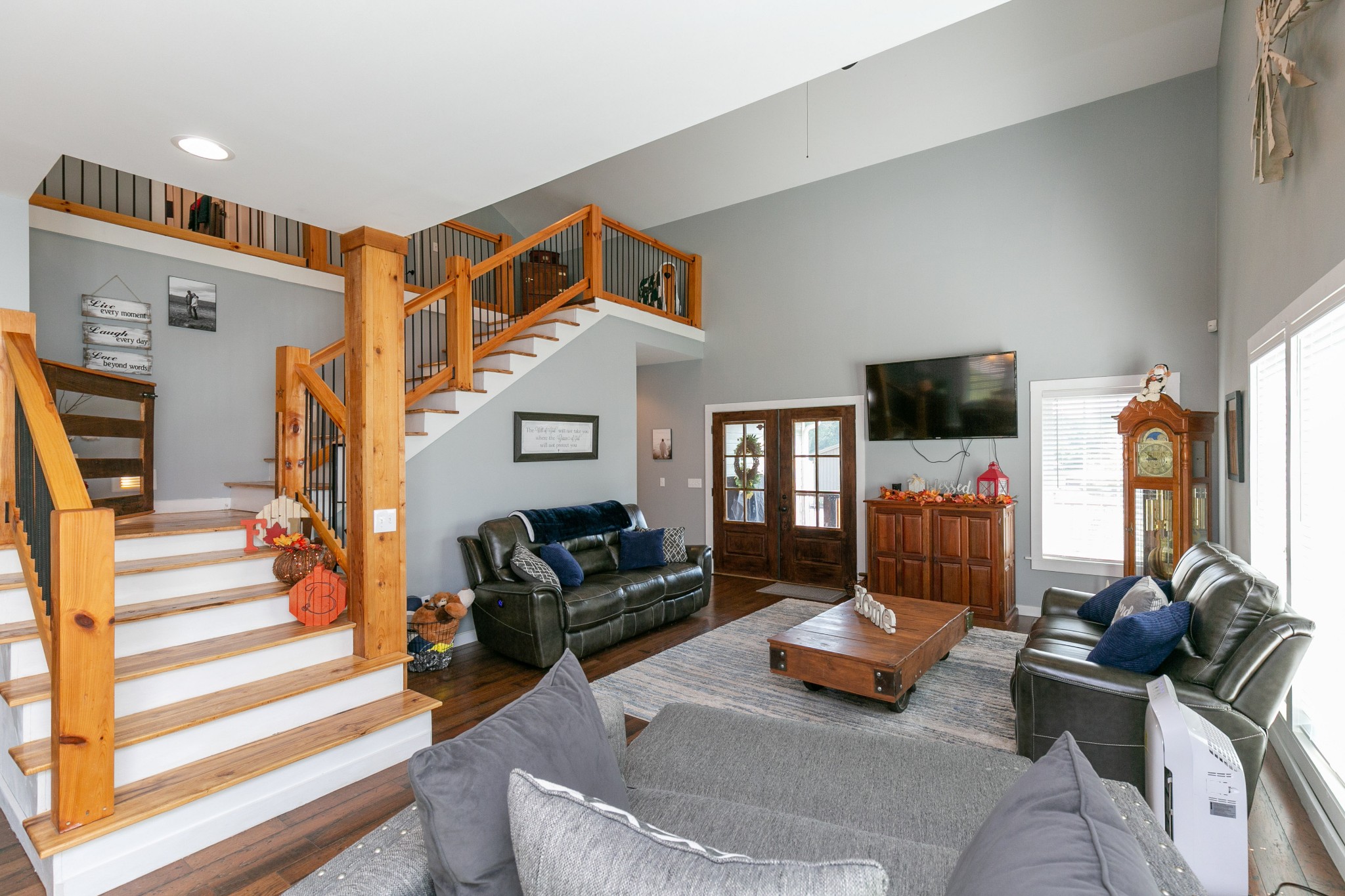 4920 Galen Road Lafayette, TN 37083 - Photo 17 of 47 a living room with furniture flat screen tv and a fireplace