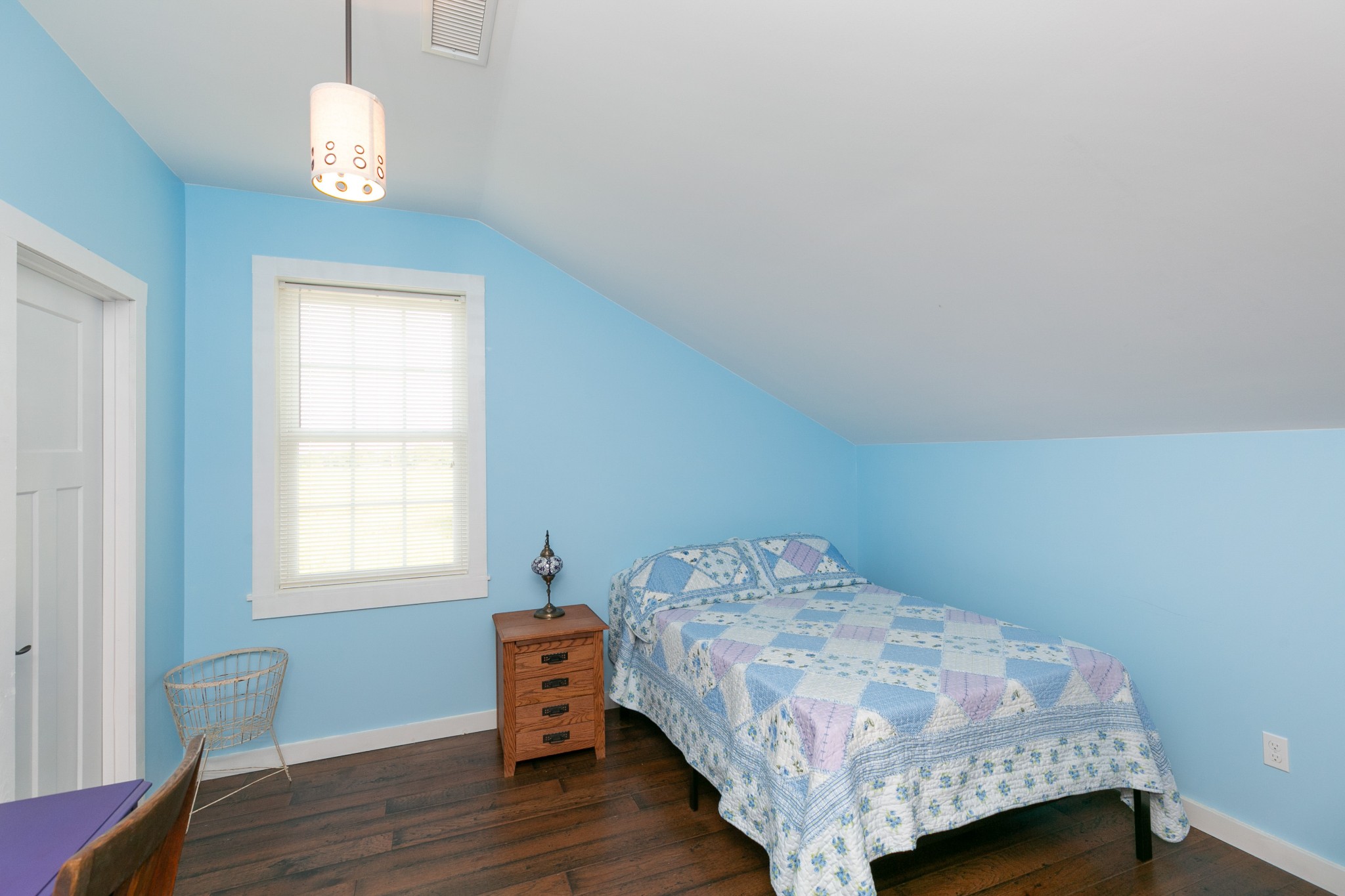 4920 Galen Road Lafayette, TN 37083 - Photo 26 of 47 a bedroom with a bed and wooden floor
