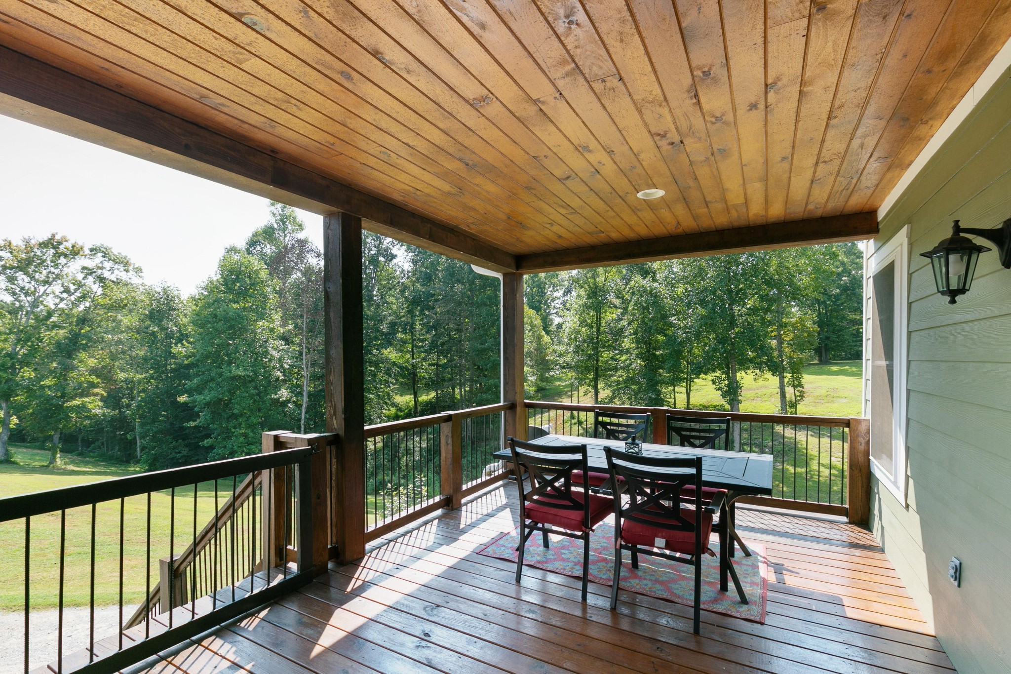 4920 Galen Road Lafayette, TN 37083 - Photo 30 of 47 a view of a porch with furniture and wooden deck