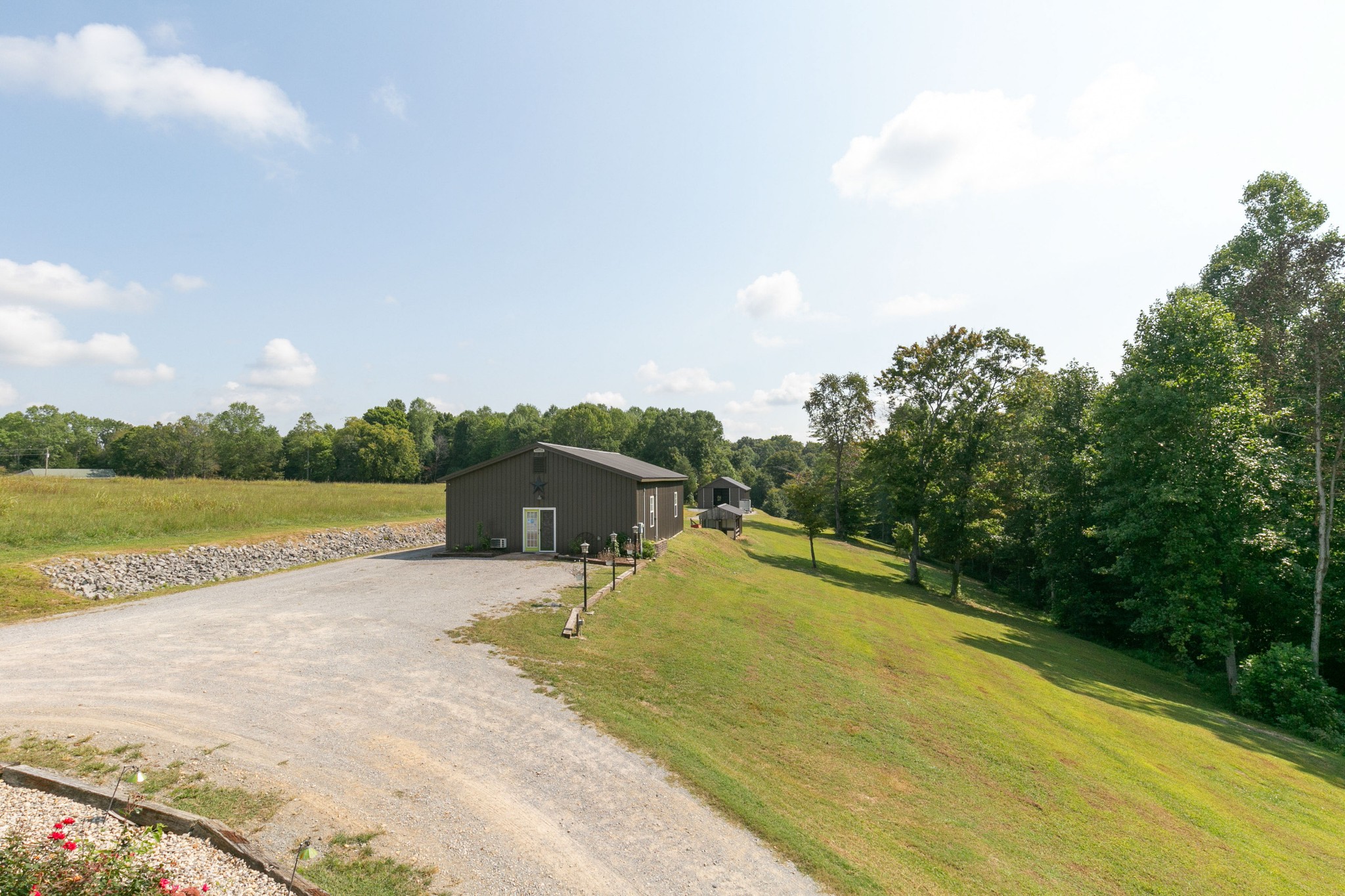 4920 Galen Road Lafayette, TN 37083 - Photo 33 of 47 a view of a swimming pool with a lake view and mountain in the back