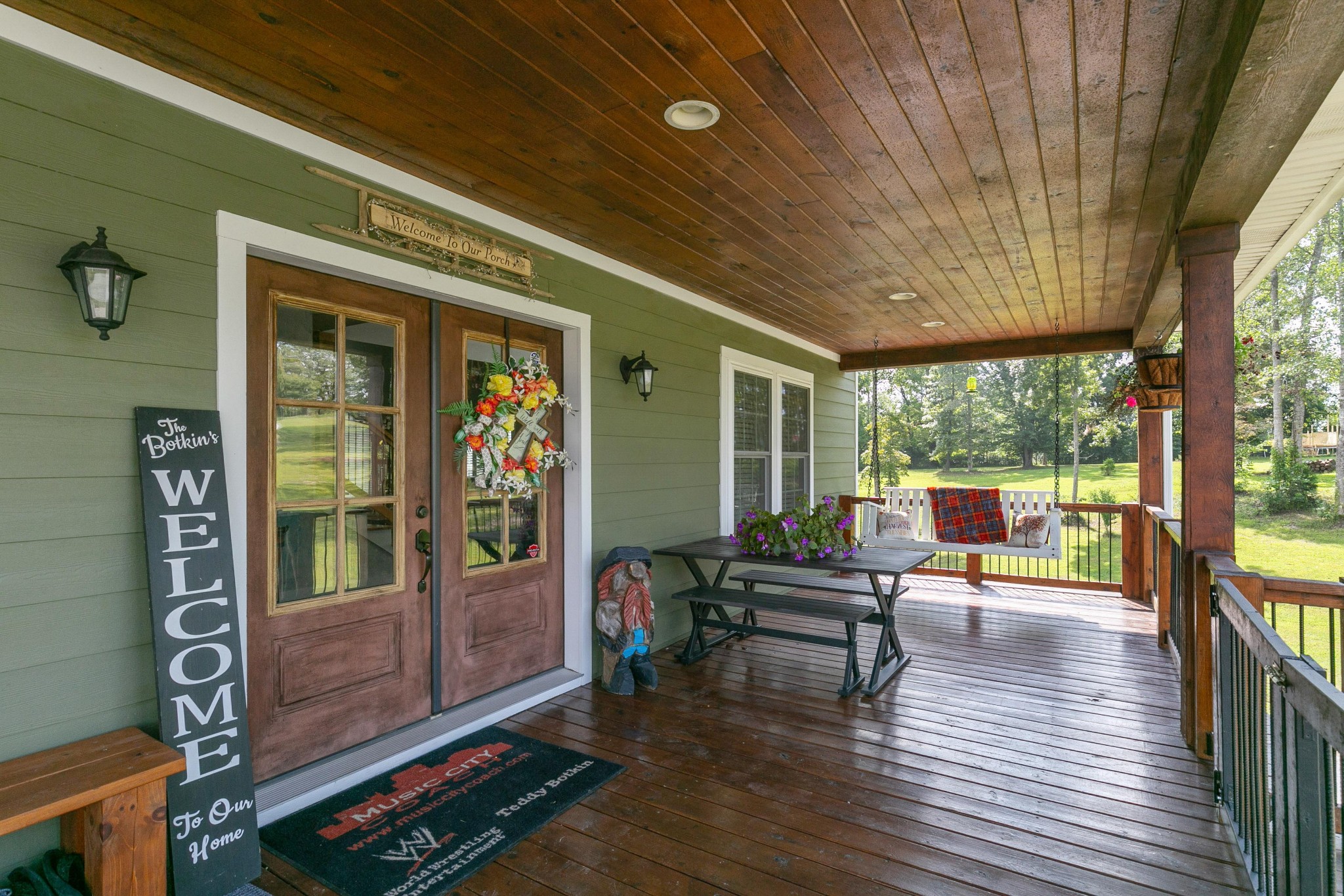 4920 Galen Road Lafayette, TN 37083 - Photo 6 of 47 a porch with chairs and wooden floor