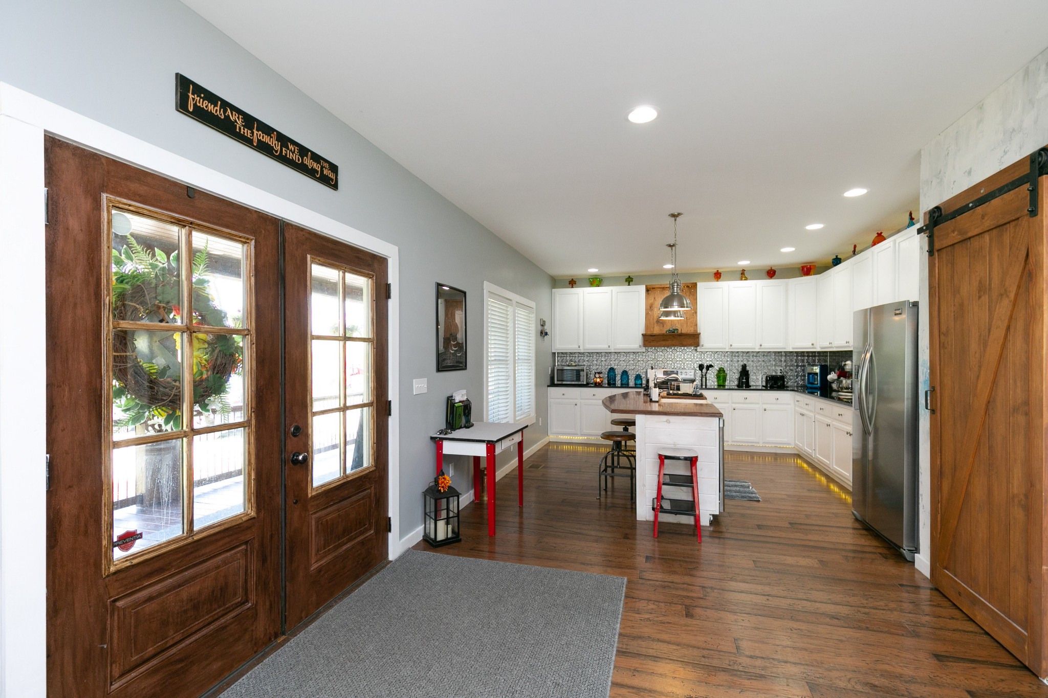 4920 Galen Road Lafayette, TN 37083 - Photo 7 of 47 a kitchen with a refrigerator and wooden floor