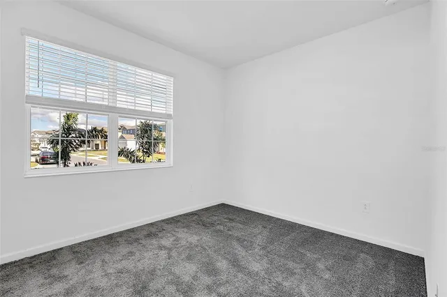 an empty room with window