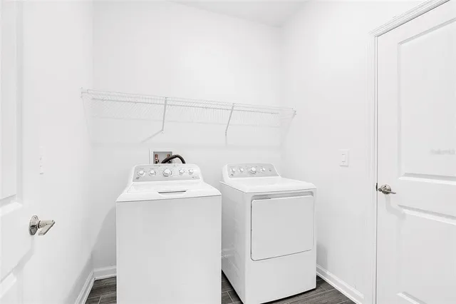 a utility room with dryer and washer