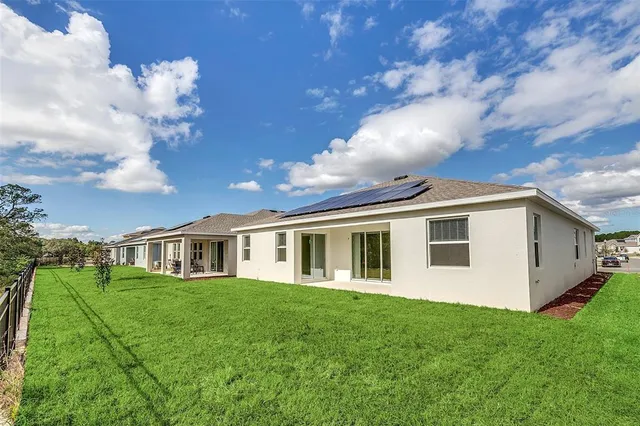 a view of a yard in front of house