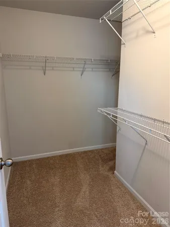 a view of a room with racks on the wall