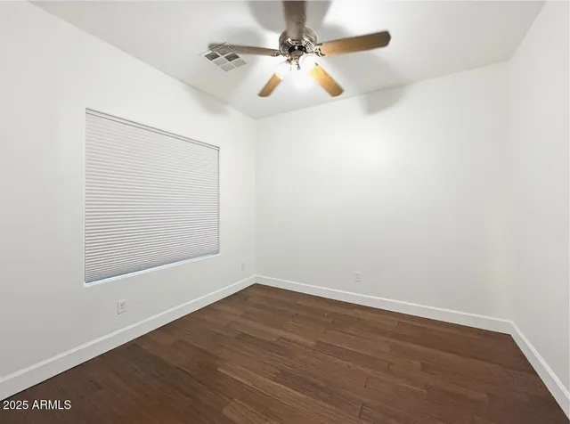 a bathroom with a sink toilet and mirror