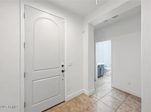 a kitchen with a sink a stove and cabinets