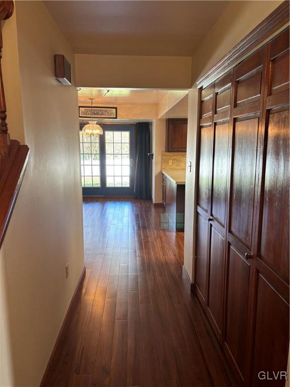 520 West Moorestown Road Nazareth, PA 18064 - Photo 13 of 46 a hallway with wooden floor chandelier and entryway