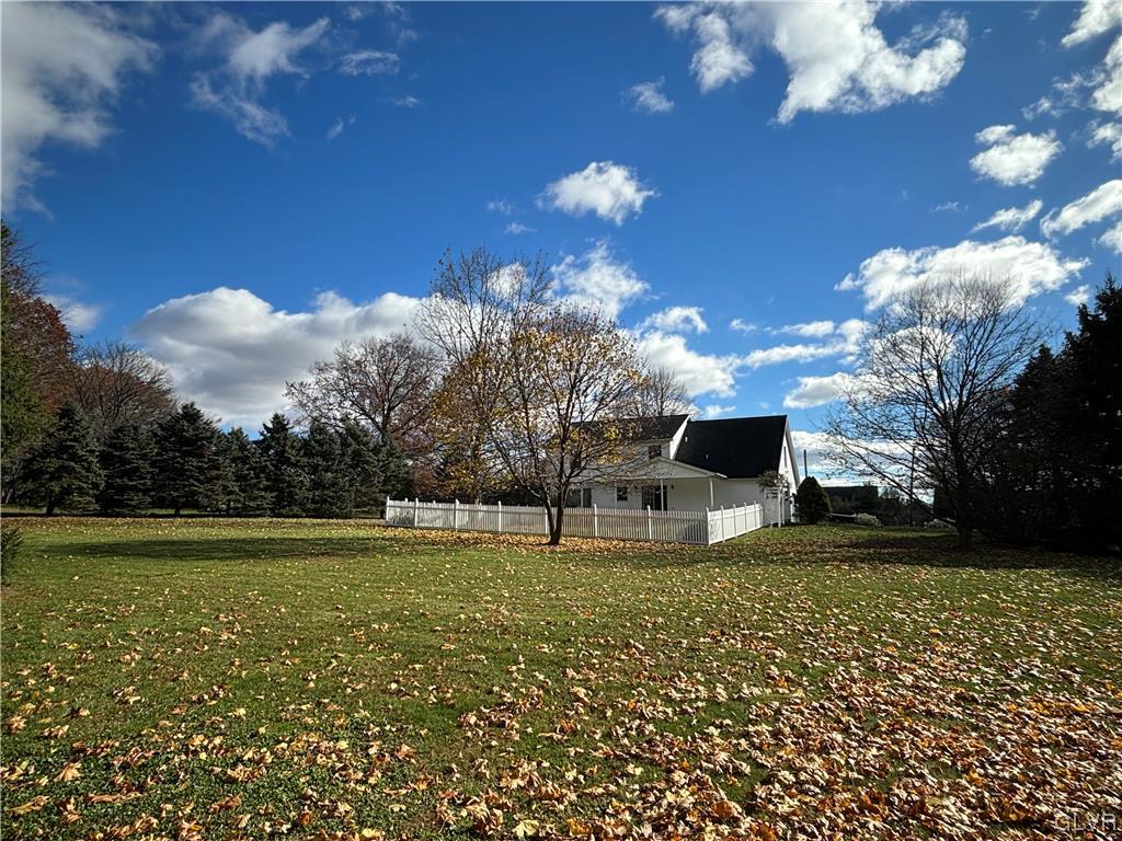 520 West Moorestown Road Nazareth, PA 18064 - Photo 43 of 46 a house view with swimming pool and trees in the background
