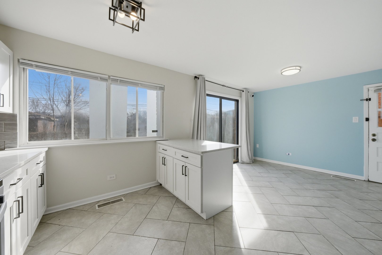 74 West 140th Street Riverdale, IL 60827 - Photo 13 of 37 a kitchen with a cabinets and sink
