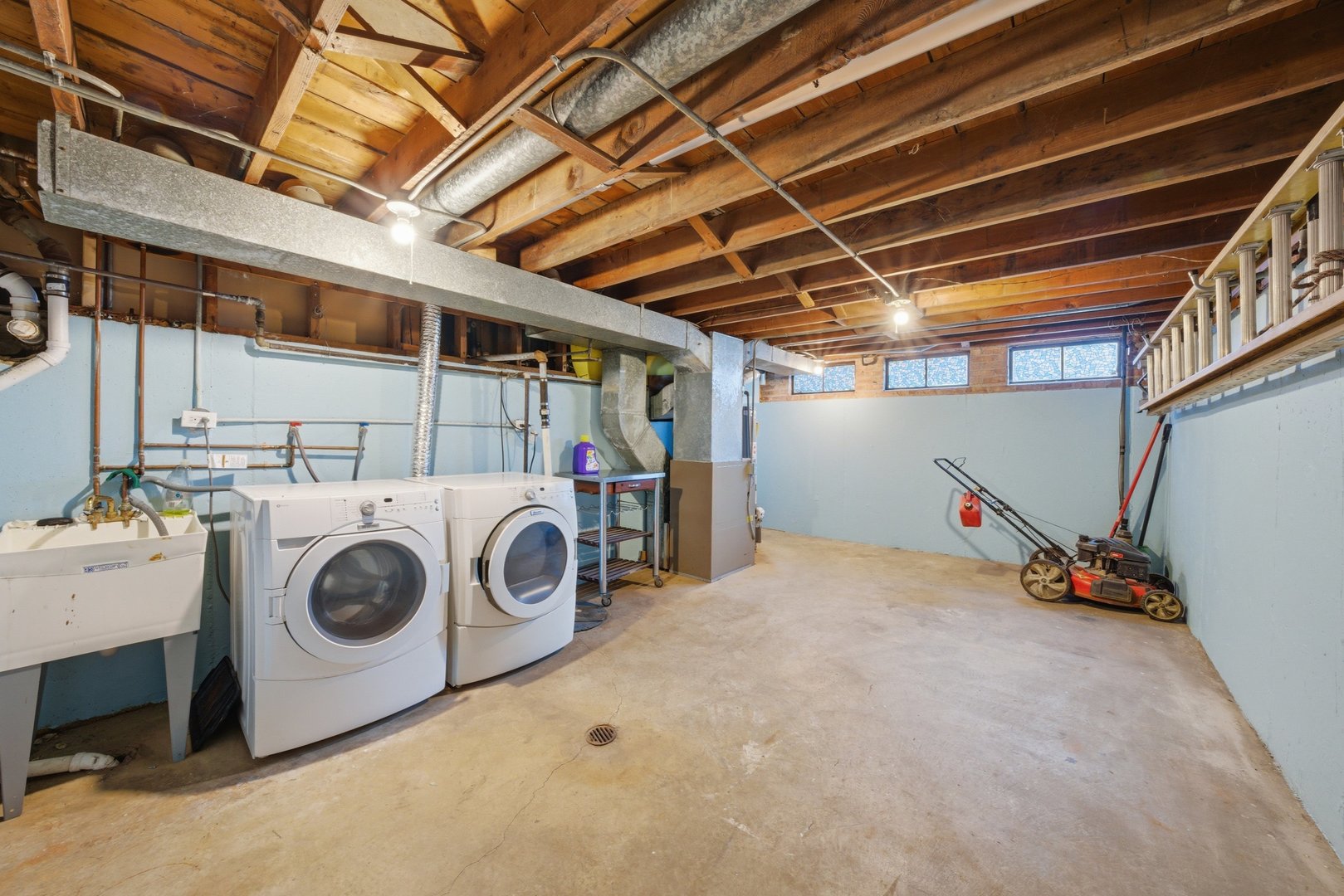 74 West 140th Street Riverdale, IL 60827 - Photo 24 of 37 a utility room with dryer and washer