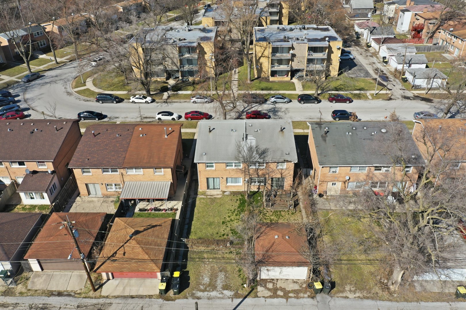 74 West 140th Street Riverdale, IL 60827 - Photo 31 of 37 an aerial view of residential houses with outdoor space