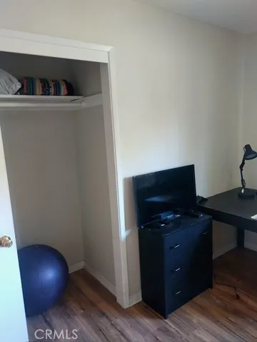 a view of workspace with wooden floor