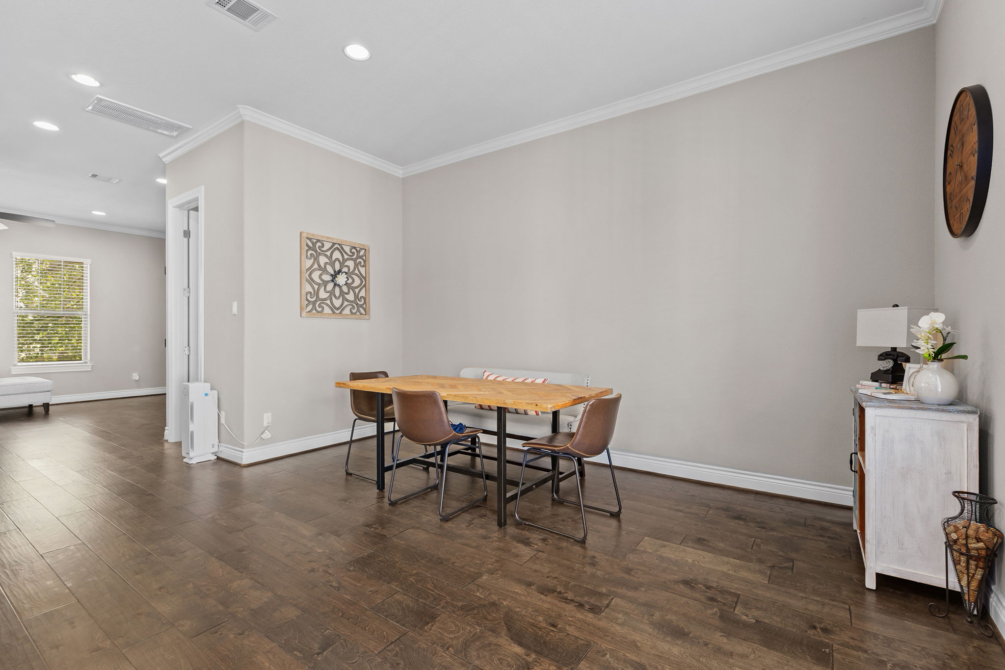 1125 Highknoll Lane Georgetown, TX 78628 - Photo 12 of 40 Dining room with recessed lighting, ornamental molding, and dark wood-type flooring