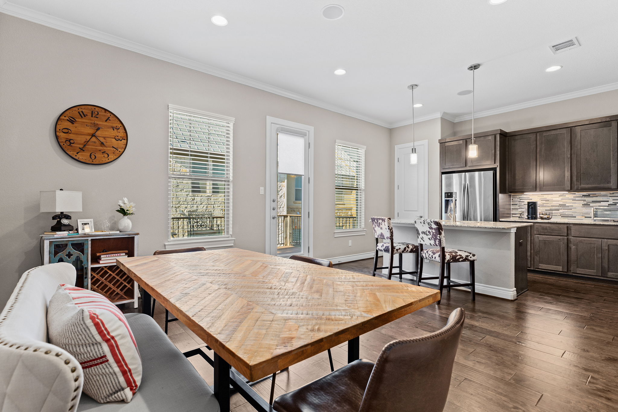 1125 Highknoll Lane Georgetown, TX 78628 - Photo 14 of 40 Dining space with crown molding, dark wood-type flooring, and recessed lighting