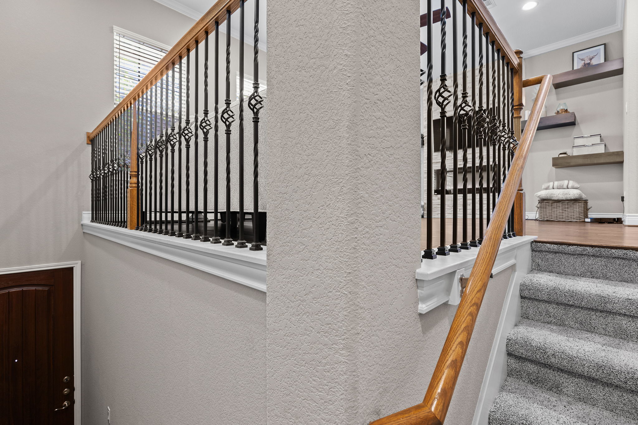 1125 Highknoll Lane Georgetown, TX 78628 - Photo 20 of 40 Stairway featuring ornamental molding and a textured wall