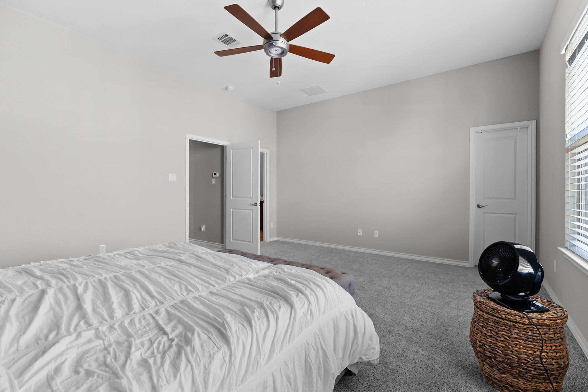 1125 Highknoll Lane Georgetown, TX 78628 - Photo 31 of 40 Carpeted bedroom featuring baseboards and ceiling fan
