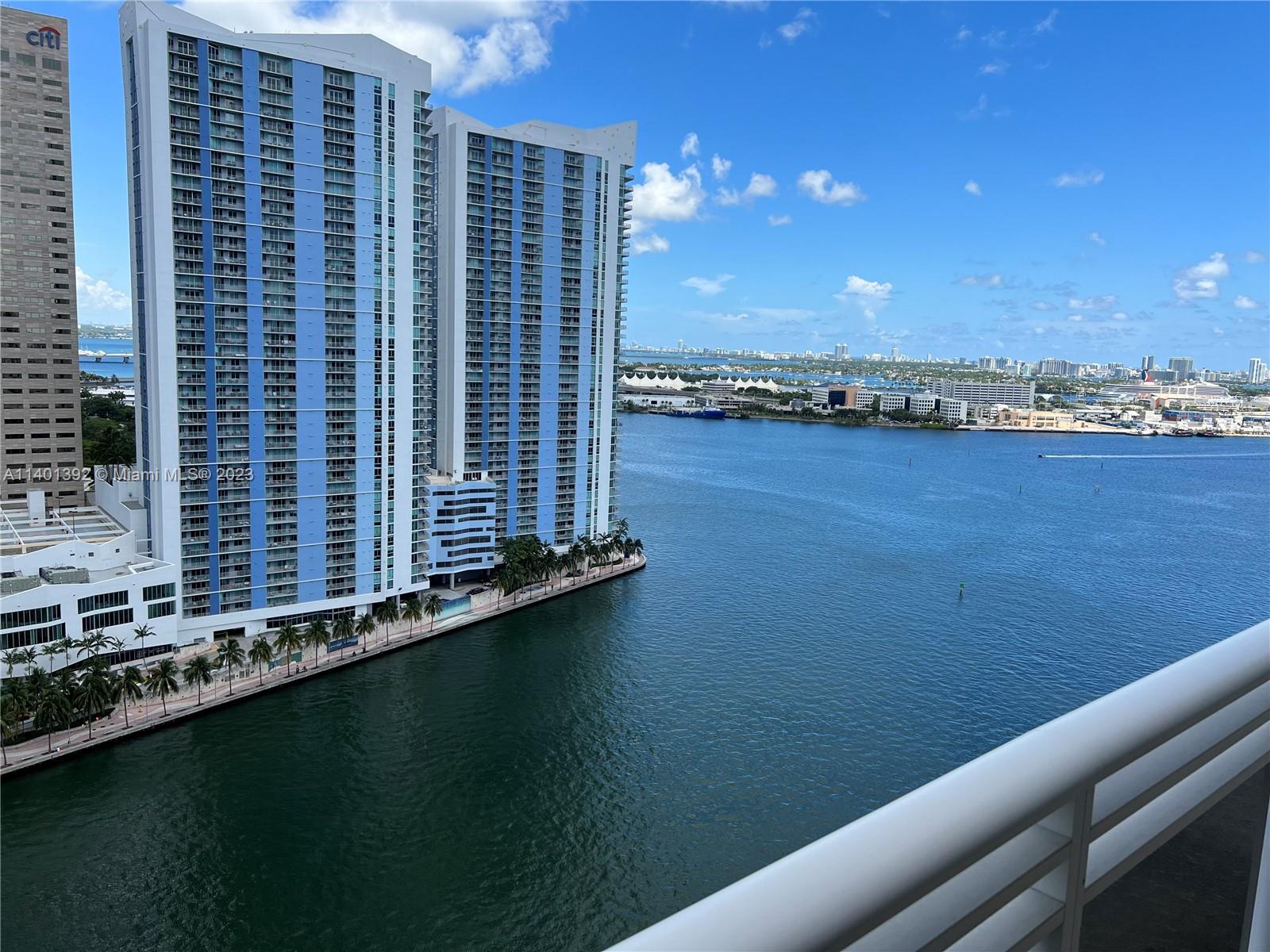 a view of a balcony with an ocean view