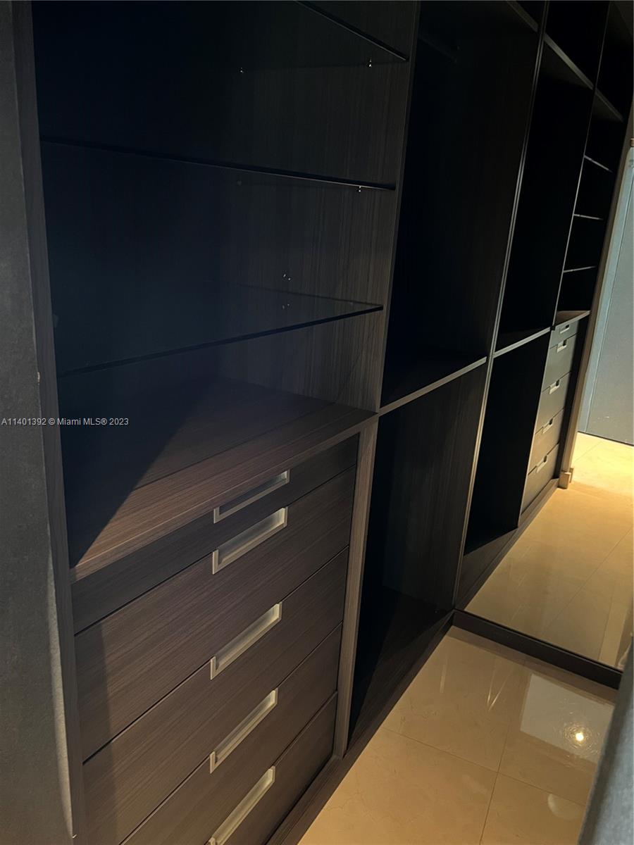 901 Brickell Key Boulevard, Unit 2506 Miami, FL 33131 - Photo 20 of 24 a view of closet