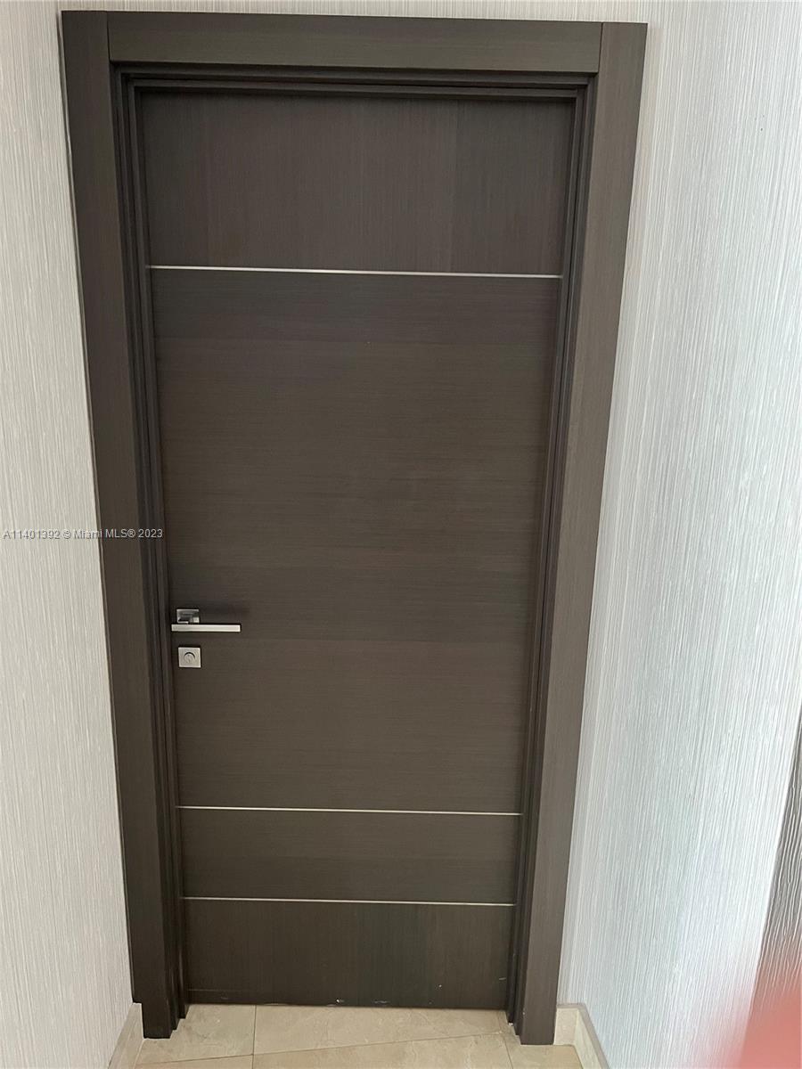 901 Brickell Key Boulevard, Unit 2506 Miami, FL 33131 - Photo 21 of 24 a view of closet