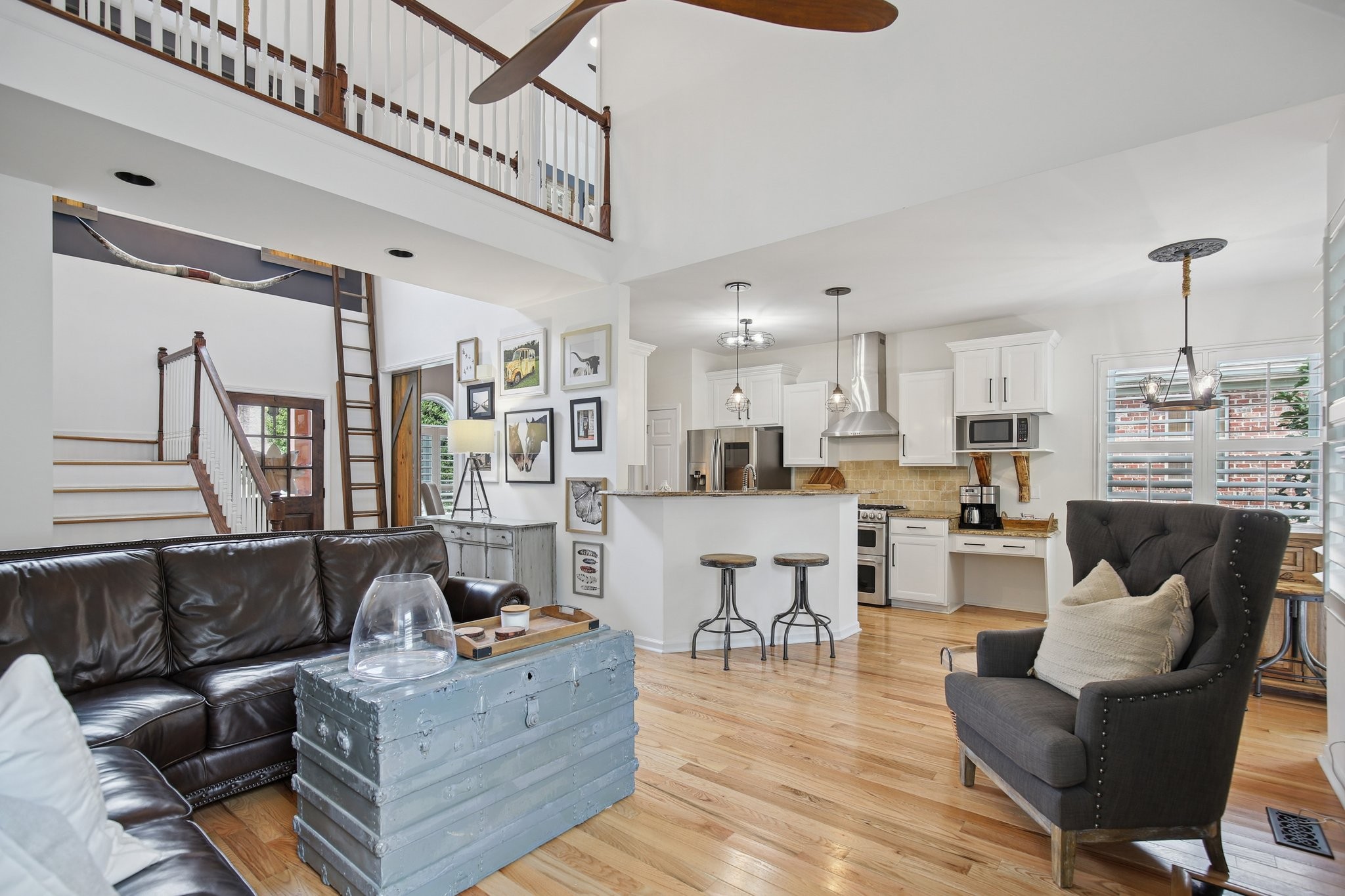 135 Ruland Circle Hendersonville, TN 37075 - Photo 20 of 89 a living room with furniture and a chandelier