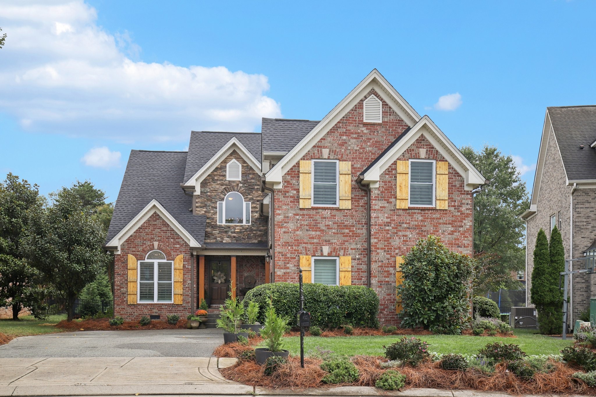 135 Ruland Circle Hendersonville, TN 37075 - Photo 3 of 89 a front view of a house with a yard and garage