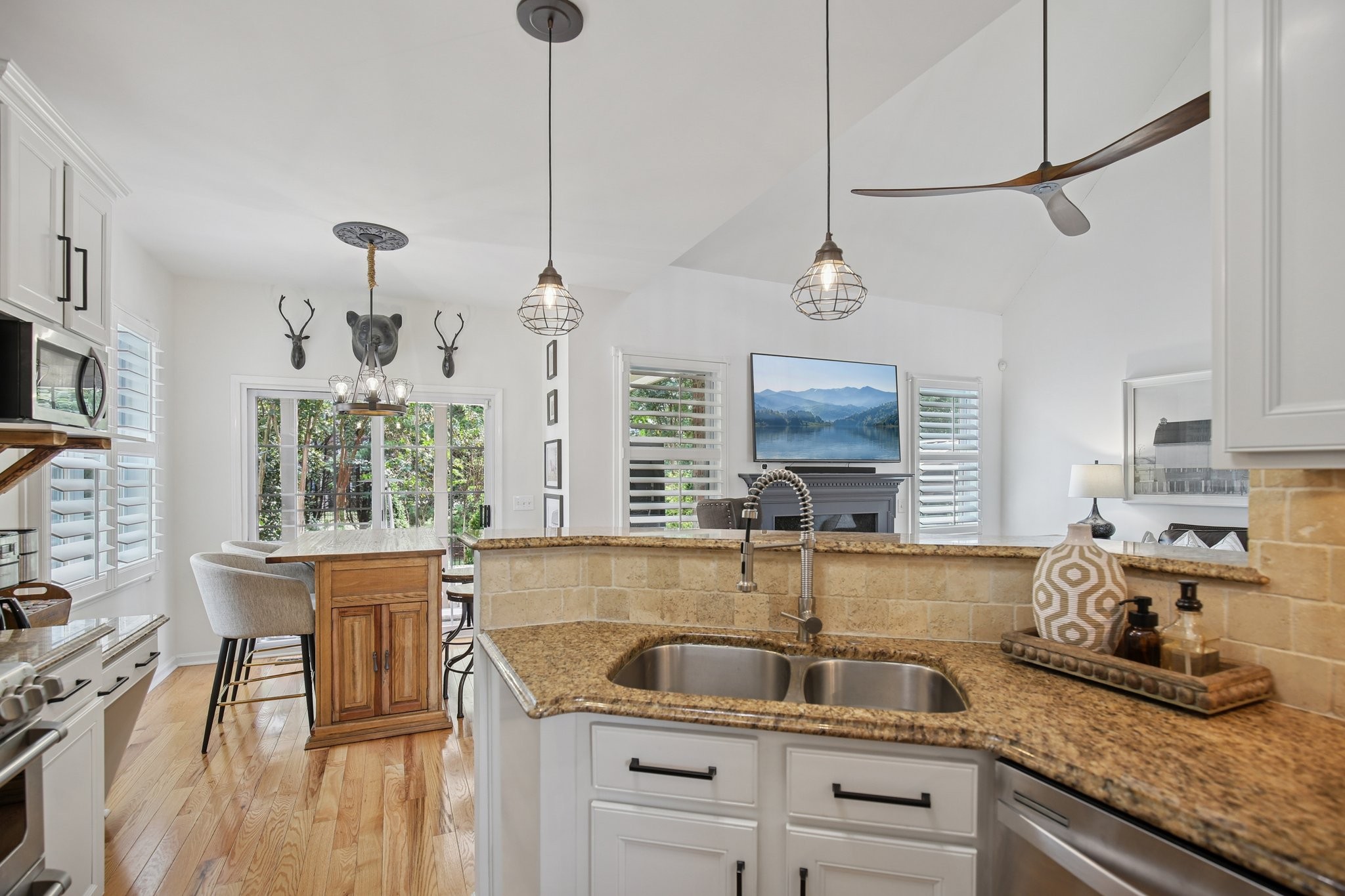 135 Ruland Circle Hendersonville, TN 37075 - Photo 37 of 89 a kitchen with granite countertop a sink a counter space appliances and cabinets