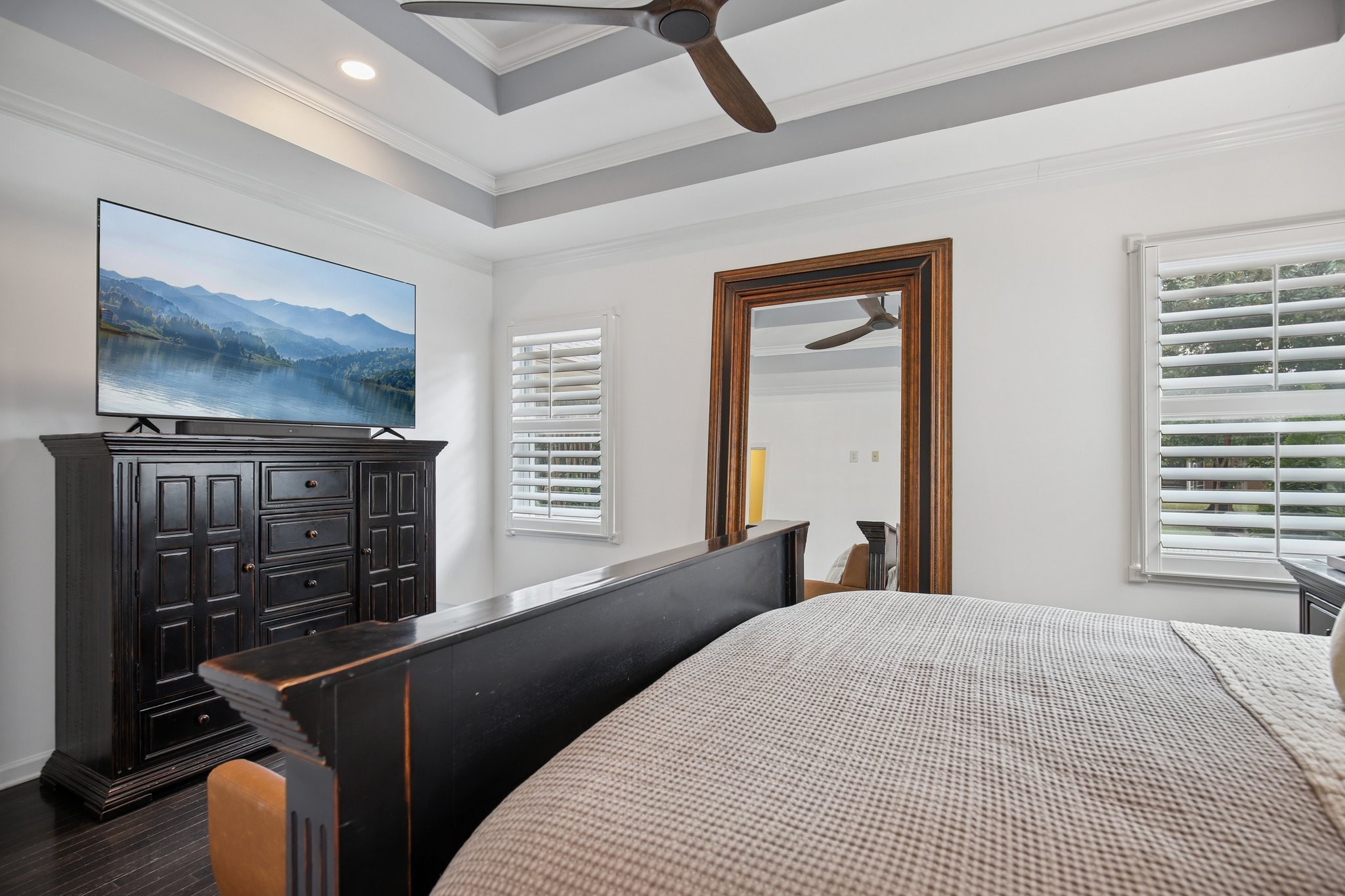 135 Ruland Circle Hendersonville, TN 37075 - Photo 42 of 89 a bedroom with a bed dresser and a flat tv screen