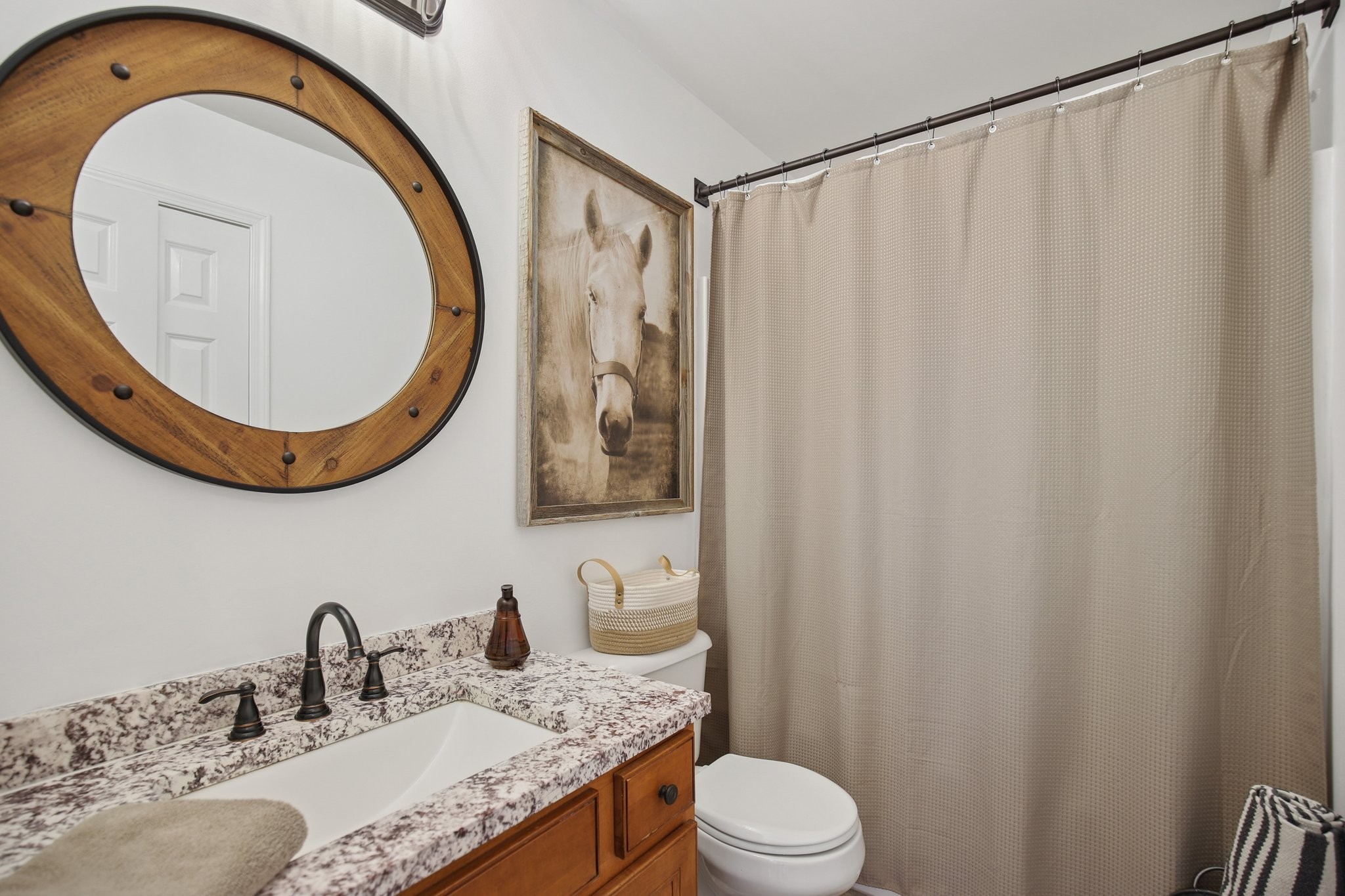 135 Ruland Circle Hendersonville, TN 37075 - Photo 60 of 89 a bathroom with a granite countertop sink and a mirror
