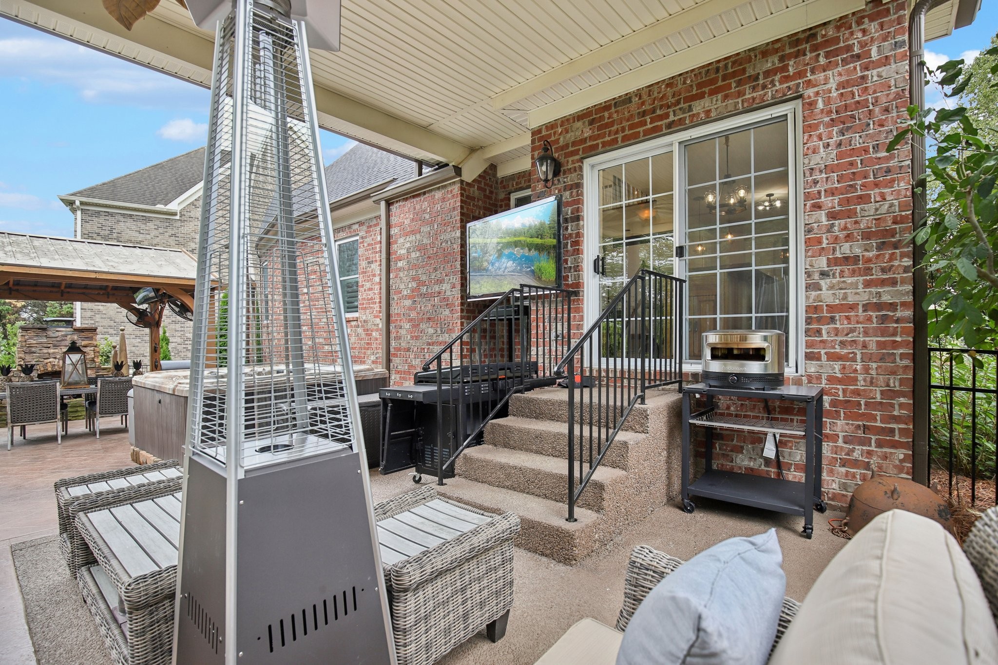 135 Ruland Circle Hendersonville, TN 37075 - Photo 74 of 89 a living room with furniture and a floor to ceiling window