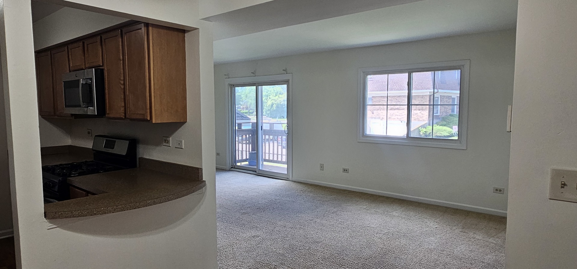 833 Village Quarter Road, Unit A3 West Dundee, IL 60118 - Photo 13 of 27 a view of a kitchen cabinets and a window