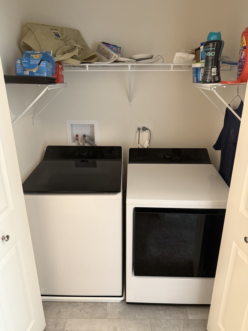 314 Summit Circle Lombard, IL 60148 - Photo 17 of 24 a close view of a utility room with washer and dryer
