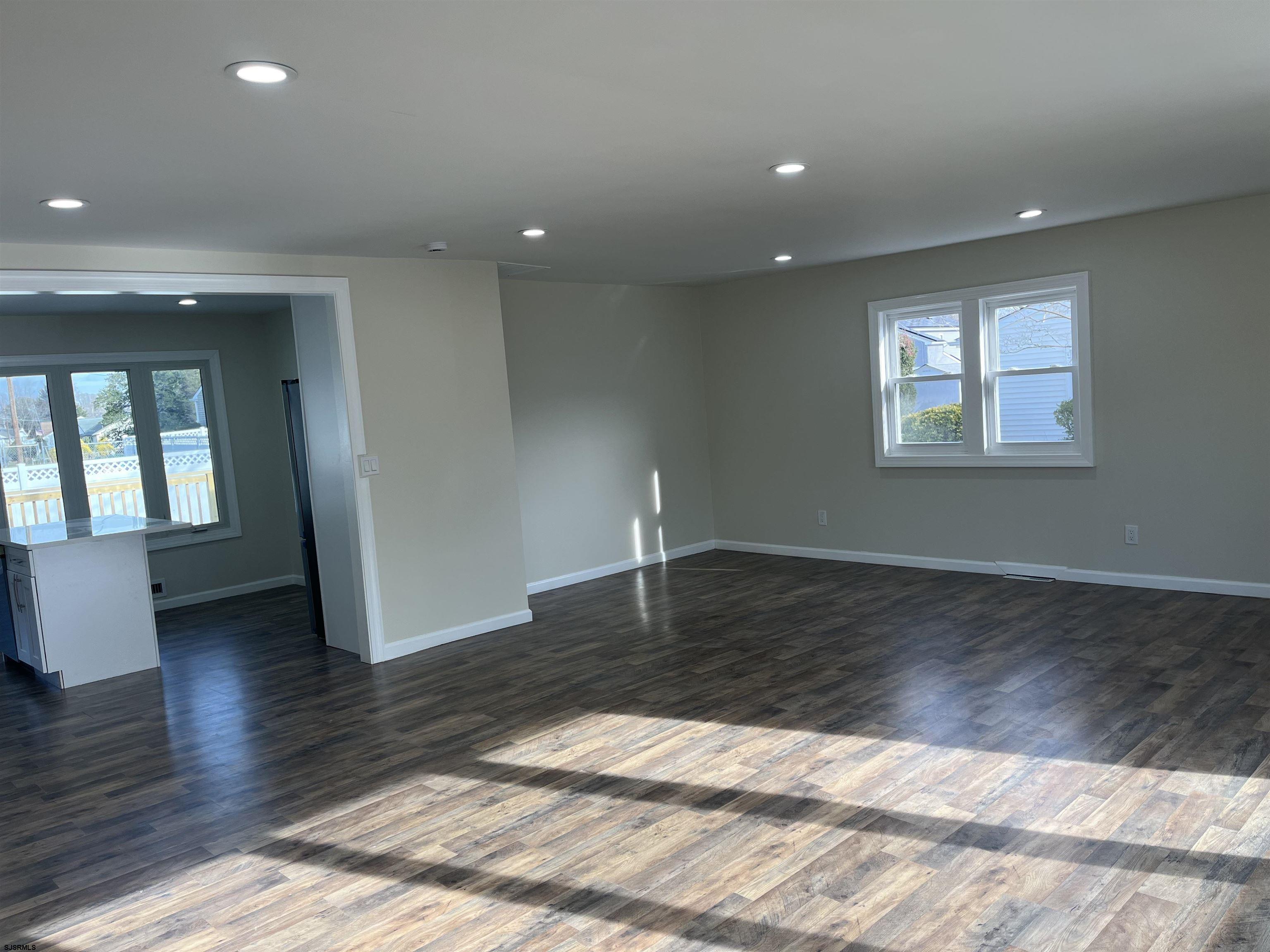19 Merion Drive Somers Point, NJ 08244 - Photo 12 of 17 a view of empty room with wooden floor and fan