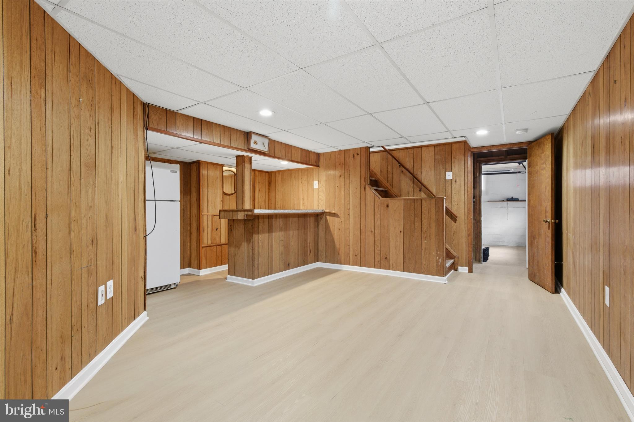 6703 Glenkirk Road Baltimore, MD 21239 - Photo 25 of 33 Basement Rec Room with Wet Bar
