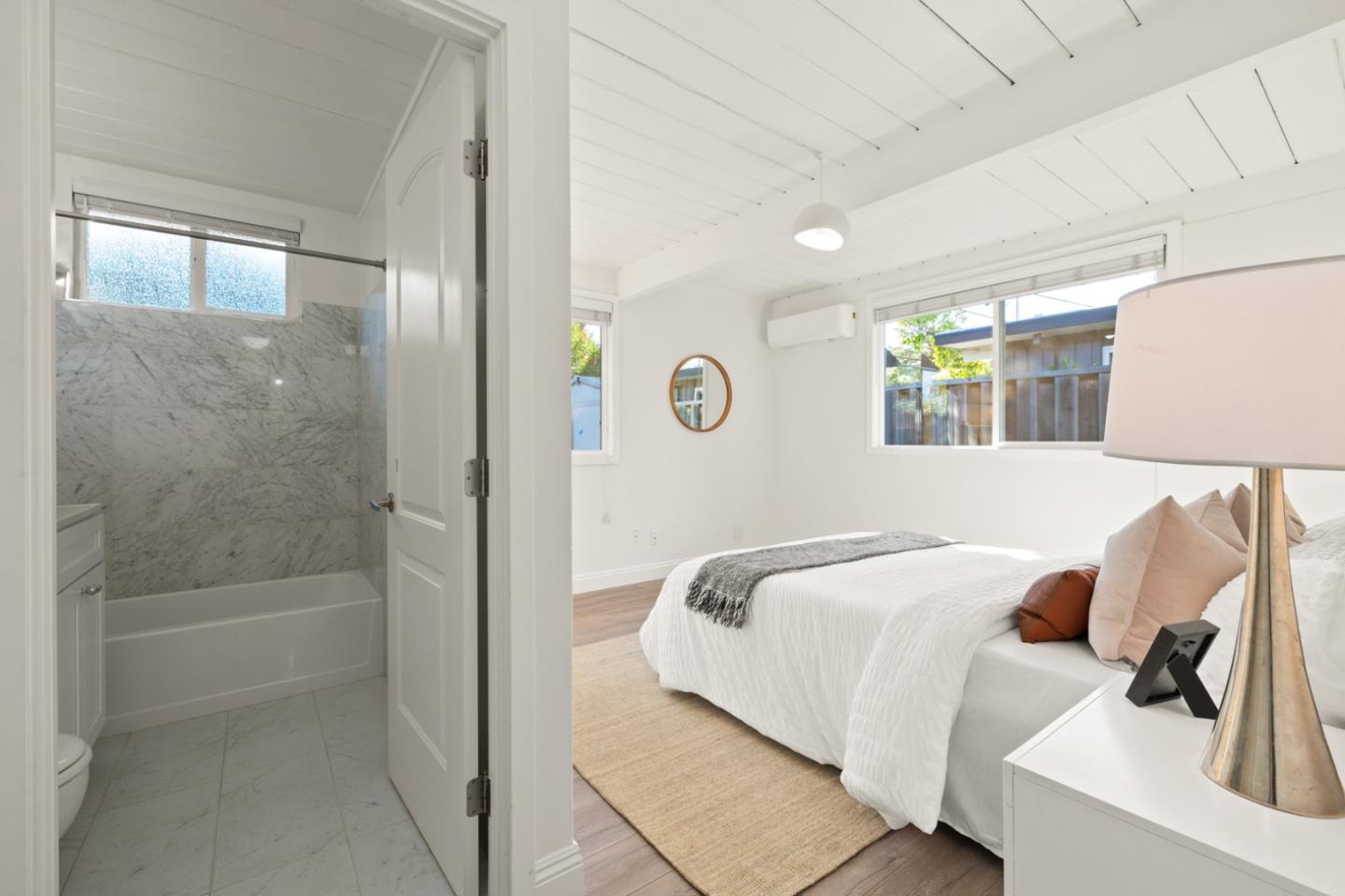 2443 Thaddeus Drive Mountain View, CA 94043 - Photo 11 of 38 a bedroom with a bed and ceiling fan