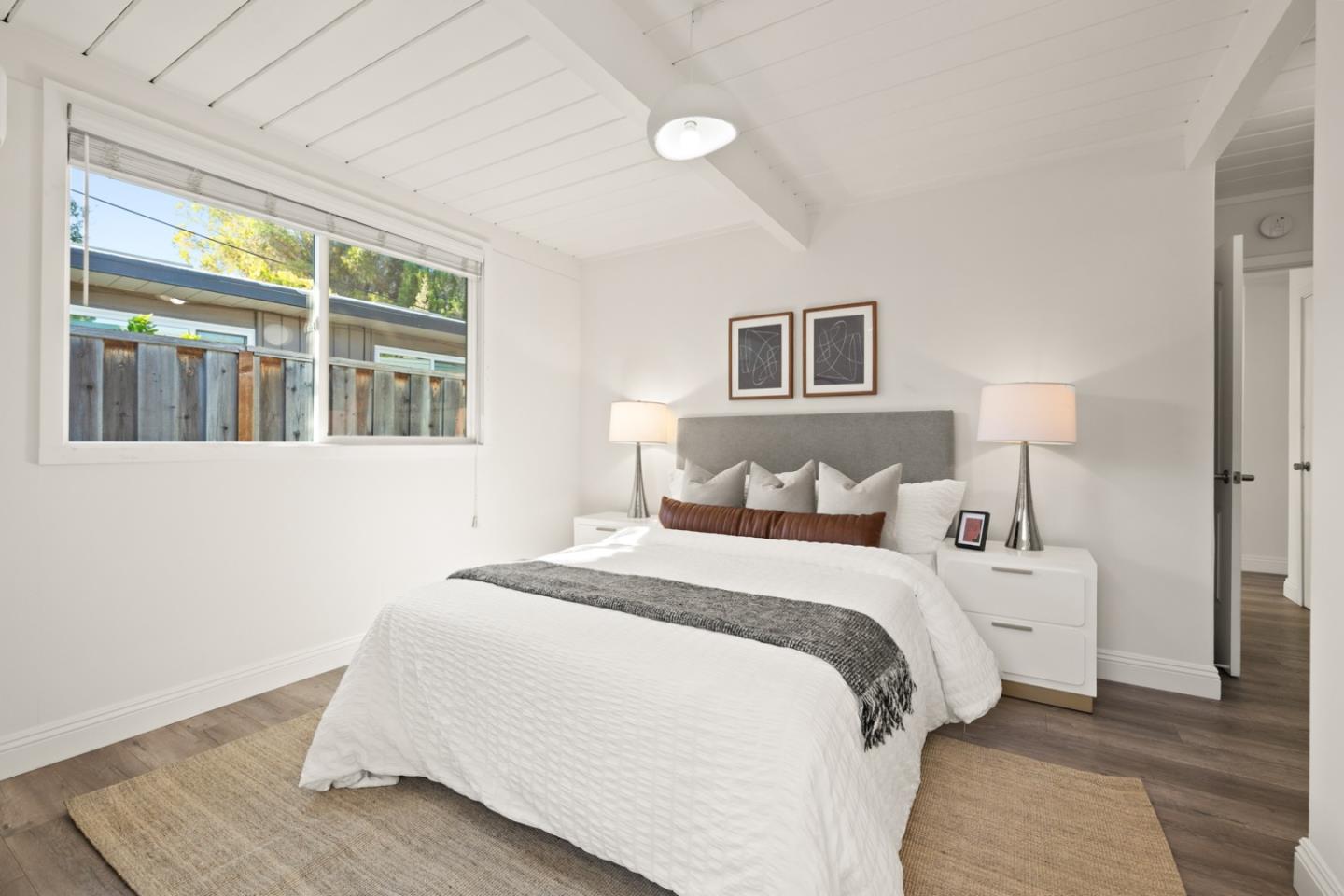 2443 Thaddeus Drive Mountain View, CA 94043 - Photo 12 of 38 a bedroom with a bed and a large window